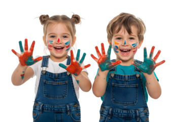 Two joyful children in overalls, faces and hands smeared with colorful paint, enthusiastically showing their hands in a fun and creative moment. isolated on white or transparent background. PNG