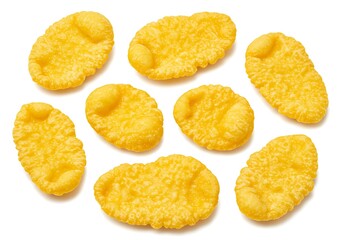 A close up shot of several golden yellow chicken nuggets isolated on a white background surface