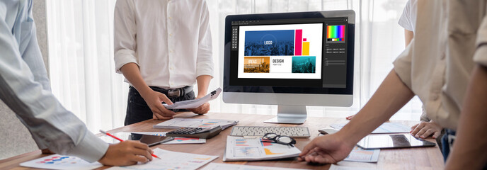 Graphic designer software for modern design of web page and commercial brisk ads showing on the...