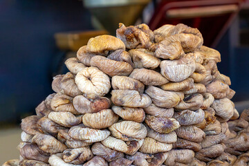 Organic dry figs fruit pile sold outside on market