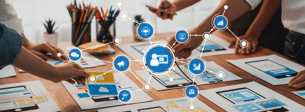 A vibrant workspace showcasing a collaborative marketing strategy session. Diverse teams engage with digital tools, brainstorming innovative ideas to enhance business growth. Amity