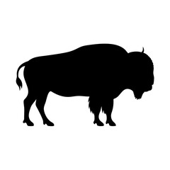 Black silhouette of a majestic bison standing on a white background