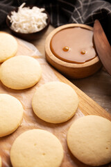 Cookies for making Alfajores. A traditional dessert popular in Latin America, it consists of two cookies sandwiched together with dulce de leche, topped with powdered sugar or shredded coconut.