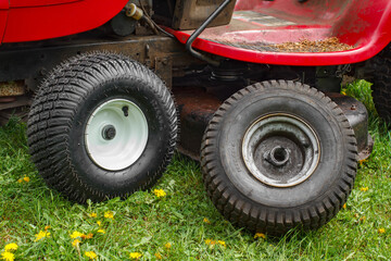 Replacing a worn out lawn tractor wheel and tire