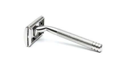 Classic stainless steel safety razor lying on white background