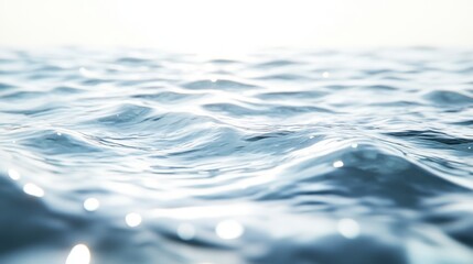 Calm water waves at sunrise on ocean