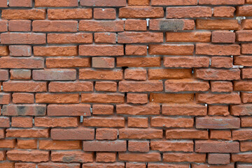 Textured Orange Brick Wall Background