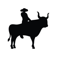 Silhouette of a Man Riding a Bull  A Classic Image of Mexican Culture and Tradition