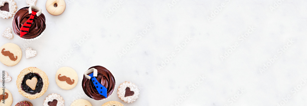 Poster fathers day themed baking corner border with a selection of cookies and sweet treats. above view on 