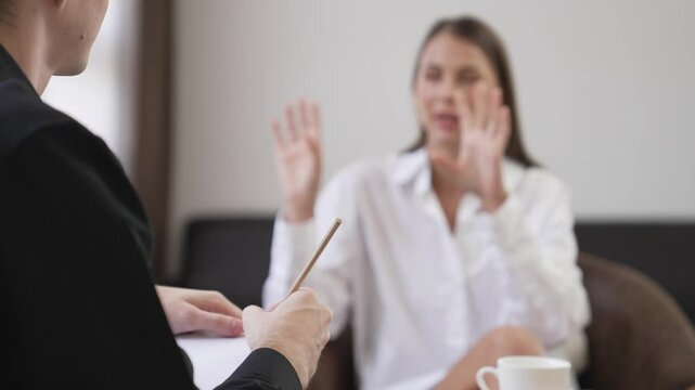 Psychological consultation gaining improvement on mental problem, young patient doing therapy session while psychiatrist making diagnostic on mental illness. Mental treatment session. Adit
