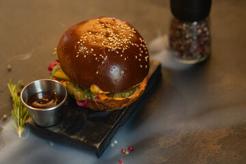 Closeup of hamburger and fries served at restaurant