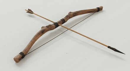 Obraz premium Handcrafted wooden bow and arrow on a neutral background isolated for commercial use