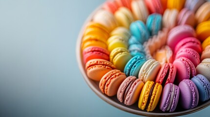 Plate of colorful macarons arranged in a spiral