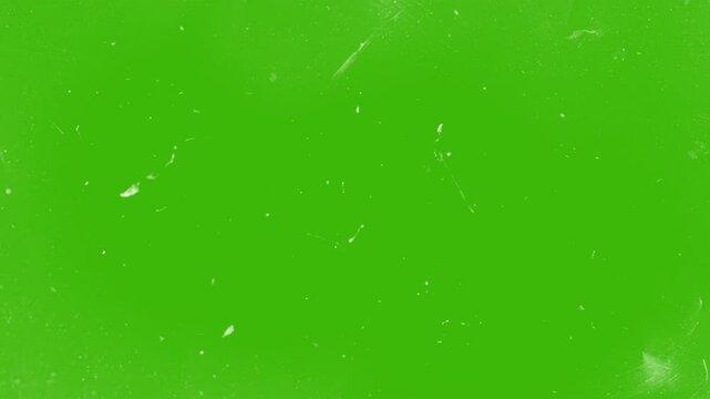 Noise, dust and scratches film stripes overlays, on green screen, chroma key, video effect	