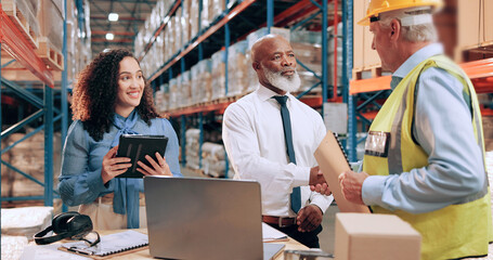 Business people, document and handshake in warehouse for logistics, meeting for supply chain collaboration. Import team, tech or shaking hands in storage for export deal, service agreement or welcome