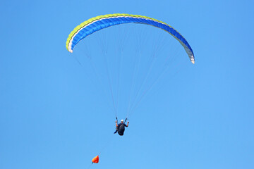 Paraglider being towed by a winch	