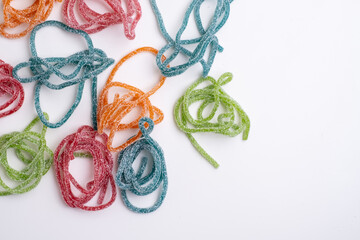 Colorful jelly candies in sugar sprinkles. Sweets and snacks. Sour tasty background of rainbow candies.