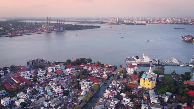 Stunning drone shot of Kochi city (also known as Cochin) in Kerala, India. It is a major port city & Often called the "Queen of the Arabian Sea, famous for Colonial architectures.