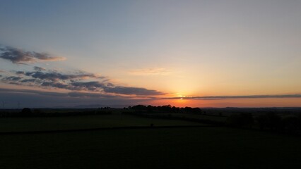 Obraz premium sunset over the field