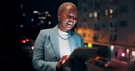 Tablet, rooftop and black woman in city at night with email communication for finance report. Laugh, technology and African financial analyst with online trading investment for deadline in town.