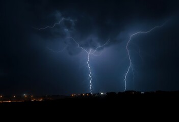 couple of lightning strikes in the night sky