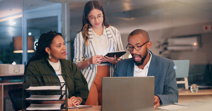 Night, business people or laptop in office for meeting, planning or explain new software. Finance team, tech or discussion in agency for budget review, company compliance or advice for audit deadline