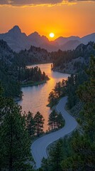 Scenic lake and winding road at sunset