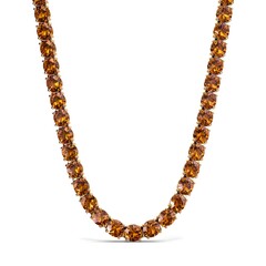 Obraz premium Elevate Special Occasions with Polished Topaz Tennis Necklace Featuring Open Prong Gem and Radiant Sparkle