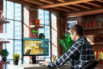 Freelancer working from home moving assets in 3D modeling program, doing interior design project....