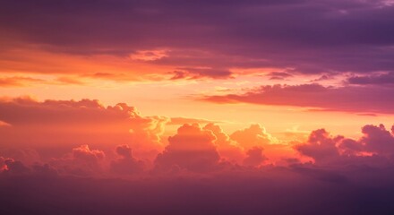 Obraz premium Dramatic Sunset Sky with Vibrant Orange and Purple Cloudscape