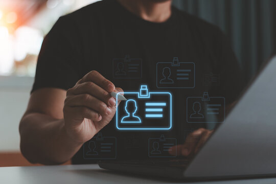 Businessman hand a digital ID profile information card for modern business authentication digital identity privacy concept. Cyber security, secure internet access, data protection in the world. - Powered by Adobe