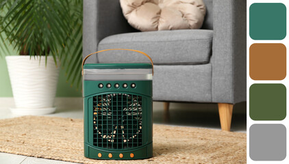 Portable table fan with humidifier on rug near armchair in living room