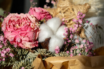 Beautiful floral arrangement with dried flowers and cotton