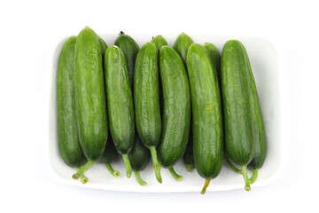 many cucumbers in package isolated on white background