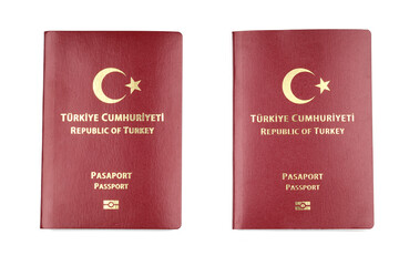 2 Turkish passports lying side by side isolated on a white background