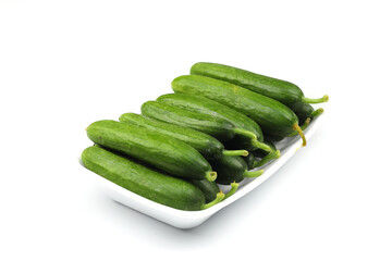 many cucumbers in package isolated on white background
