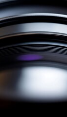 close up of a camera lens with a blurry background