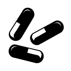 Three black and white medicine capsules pills on a plain white background