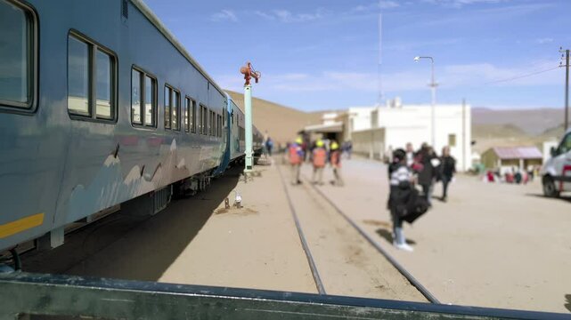 Blurred Passengers Boarding the Train to the Clouds at San Antonio de los Cobres Station, Salta Province, Argentina - 4K

