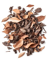Aromatic loose leaf tea, brown and tan hues, scattered on white background