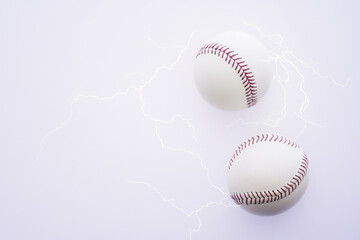 Baseballs in Electric Storm: High-Energy Sports Photography.