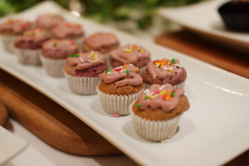 Delicious Mini Cupcakes with Frosting and Sprinkles