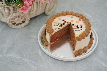 Delicious Chocolate Cake with Cream Frosting and Sprinkles