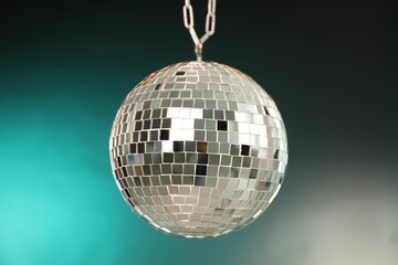 Shiny disco ball on color gradient background