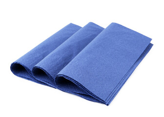Many blue paper handkerchiefs isolated on white