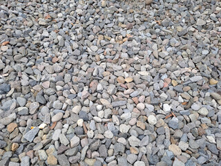 Gravel texture or gravel background for design. Real grunge texture background and small stone.Top view of ground gravel road. selective focus.	