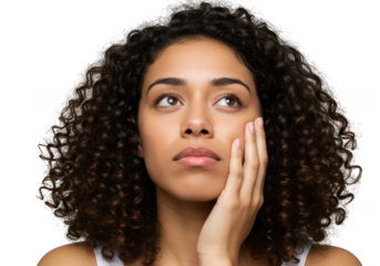 Portrait of a woman with curly hair looking upwards and resting her face on her hand in contemplation isolated on transparent background