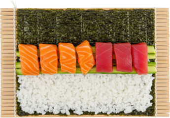 Sushi Making Ingredients Salmon Tuna Rice Nori Seaweed on Bamboo Mat