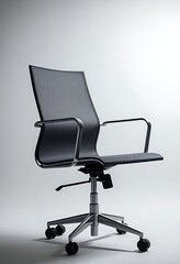 black office chair sitting on top of a white floor