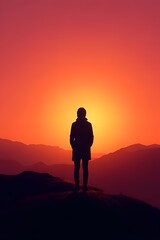 Fototapeta premium Silhouetted hiker against a majestic sunset landscape